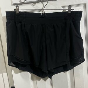 lululemon black hotty hot shorts sz 12